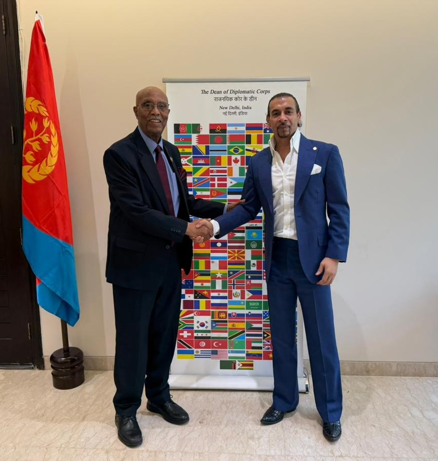 Gurdip Dev Bath shaking hands with the Dean of the Diplomatic Corps in New Delhi